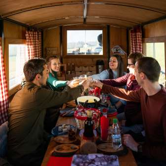 Balade en calèche pour la fondue © Heidiland Tourisme / Kevin Wildhaber