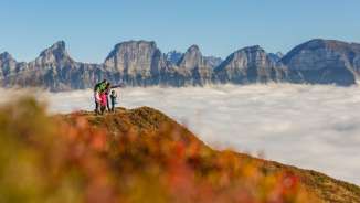 Famille au Flumserberg au-dessus de la mer de brouillard